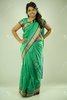 18688213-pretty-asian-woman-wering-green-indian-outfit.jpg